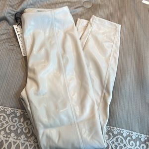 Nicole Miller faux leather crème colored pants. Size small. Brand new.